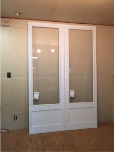 Custom wood double storm doors