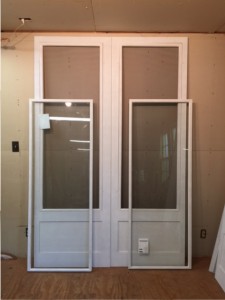 Custom wood storm screen combination insert doors