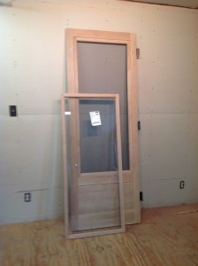 Custom wood storm screen combination insert door