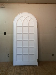 Arched top with gothic mullions custom wood door