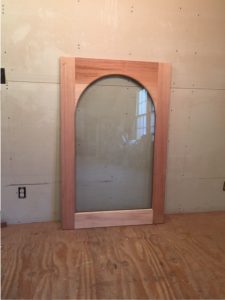 Custom mahogany wood arched top window sash