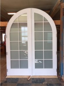 Custom wood arched top double french door unit