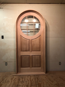 Arched top mahogany wood door